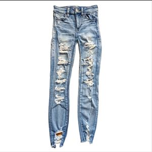 American Eagle High Rise Super Distressed Next Level Stretch Jegging Jeans